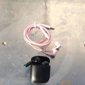 Wireless Black Bluetooth Earbuds and Pink Wired Earphones